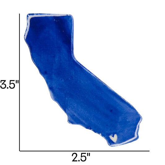 Handmade California state ceramic magnet in blue glaze with white heart, custom personalized souvenir on white background. Includes measurements