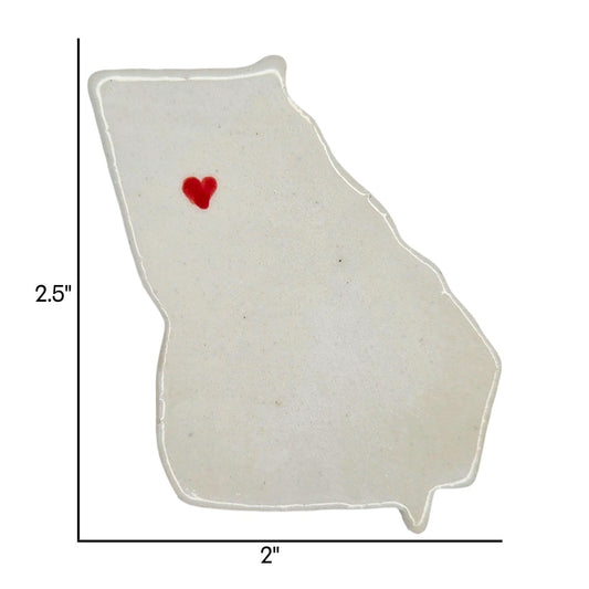 Handmade Georgia state ceramic magnet with red heart, custom personalized souvenir on white background. Includes measurements.