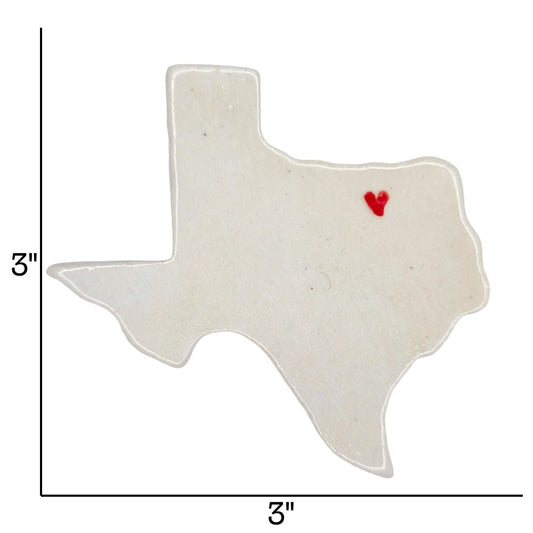 Texas-shaped ceramic magnet with a red heart on a white background. Includes measurements.
