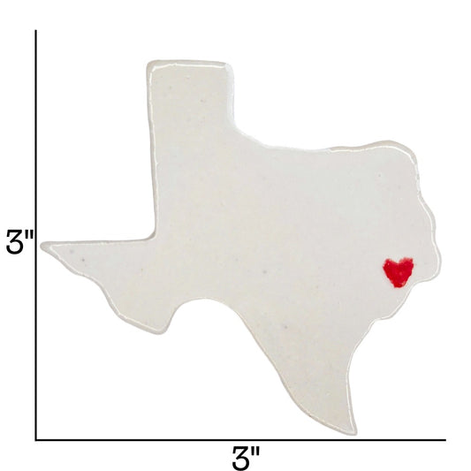 Texas-shaped white ceramic magnet with a red heart over Houston. Includes measurements.