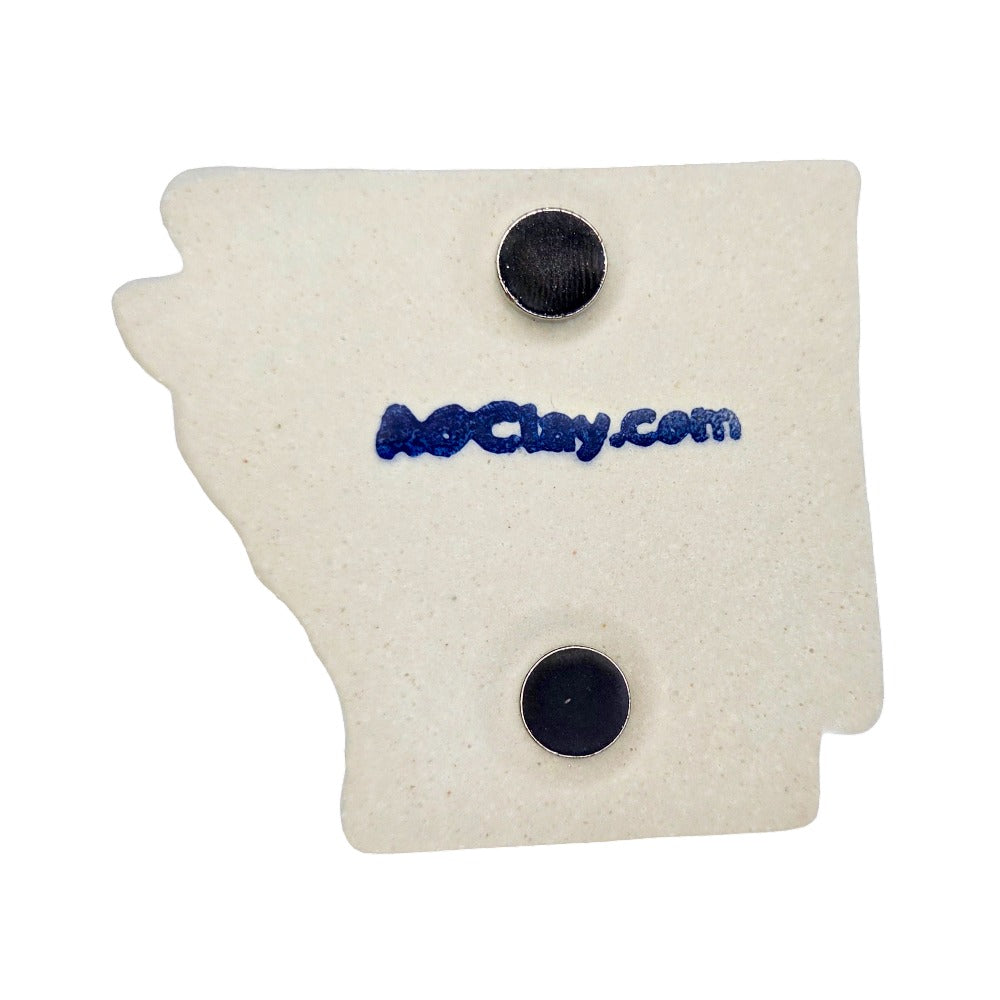 Back of white Arkansas Ceramic Magnet with Blue aoclay.com on the back.