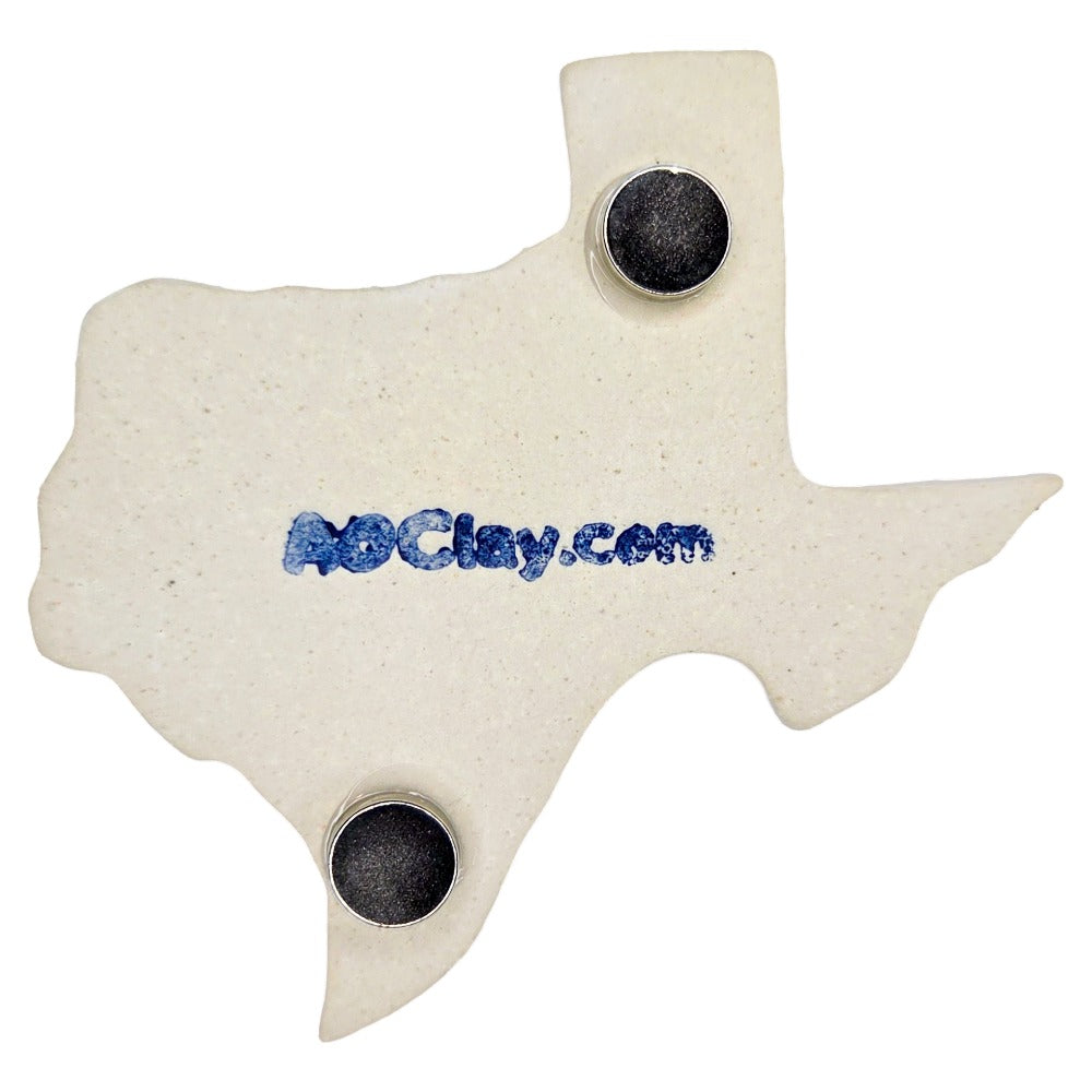 Back of a Texas-shaped ceramic magnet with 'AOClay.com' branding on a white background