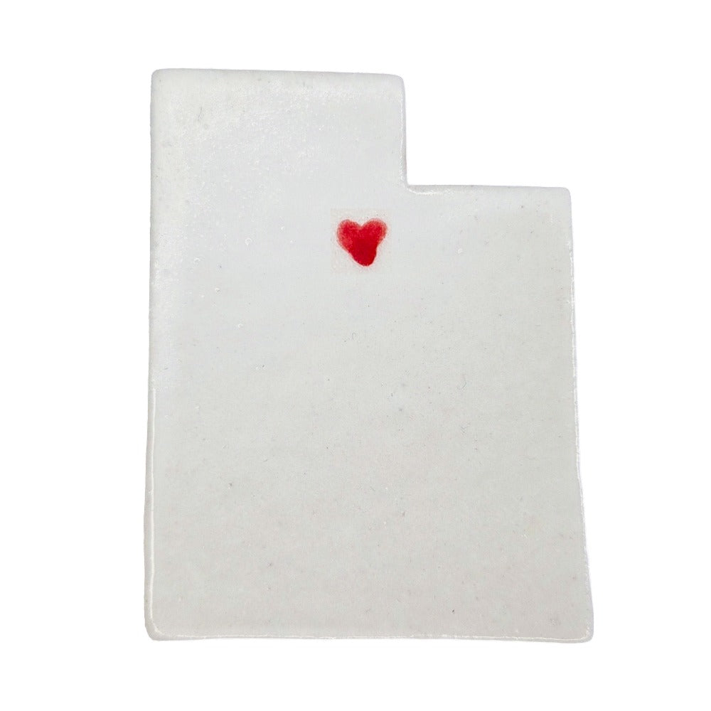 Handmade Utah state ceramic magnet with red heart, custom personalized souvenir on white background